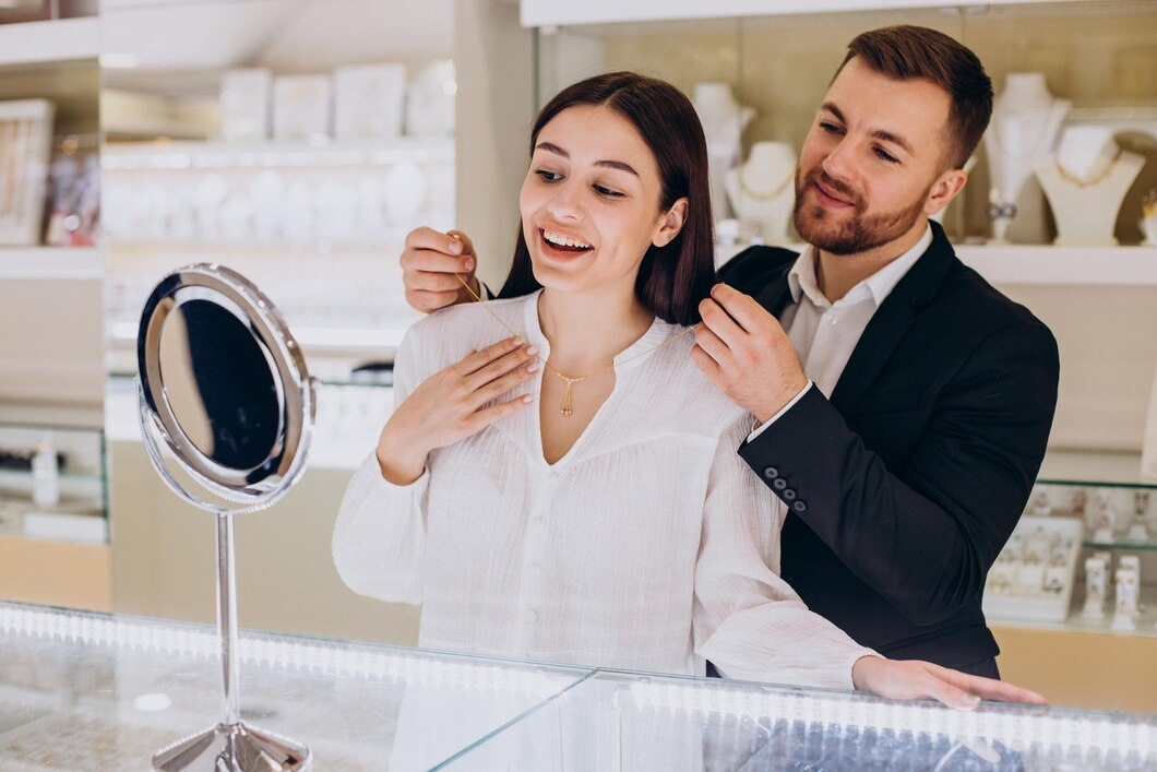 young couple choosing a necklace at jewelry store